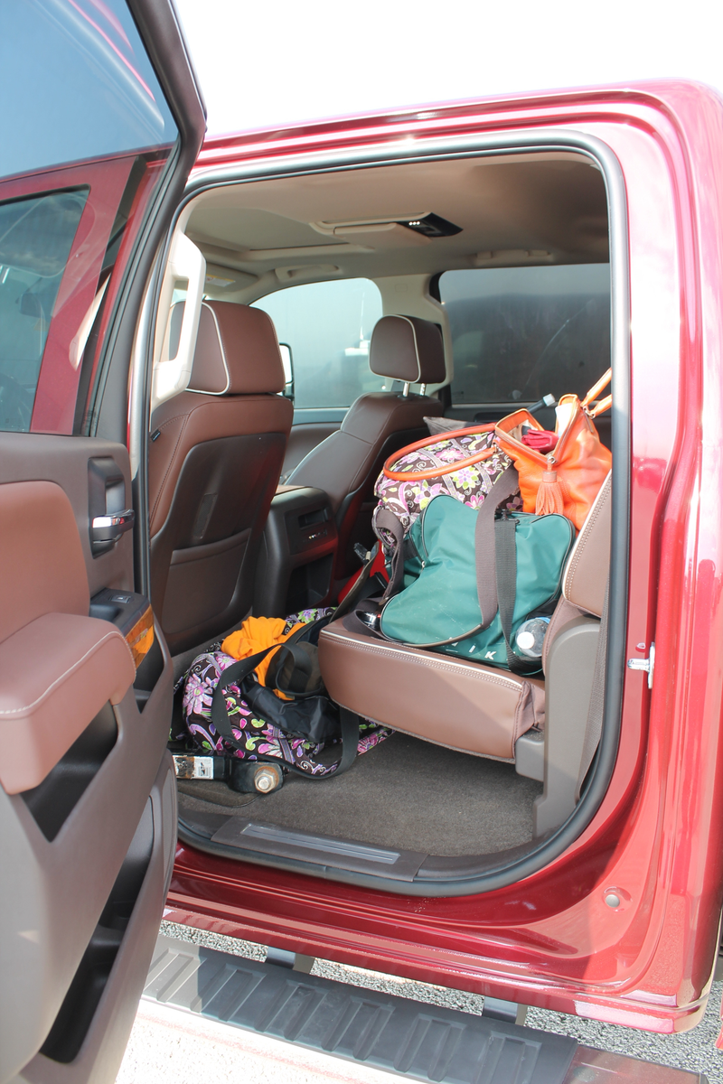 Illustration for article titled Towing A Race Car With A Small House: The Silverado 2500 High Country